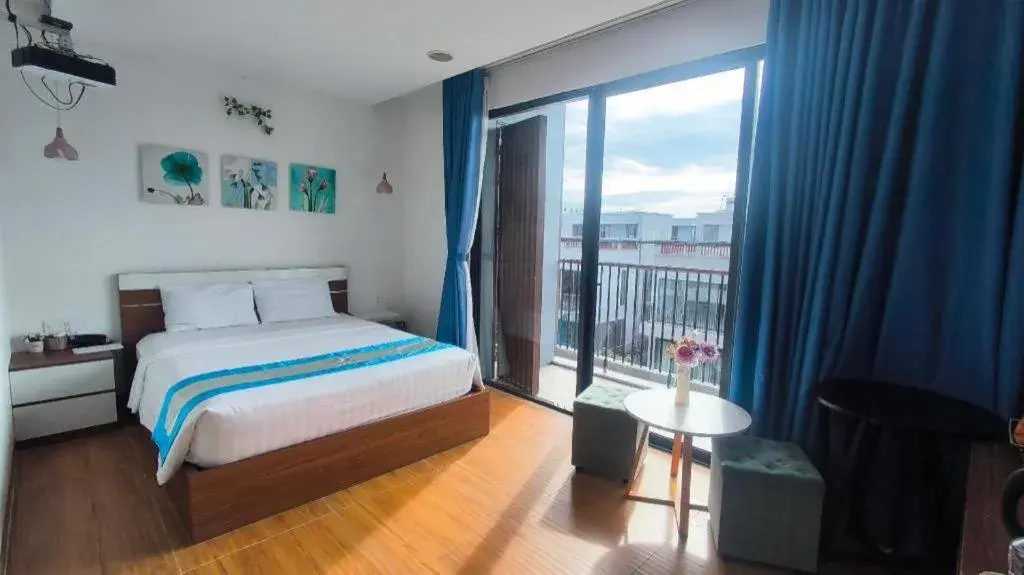 Bed in Flora Hotel Bed in Flora Hotel