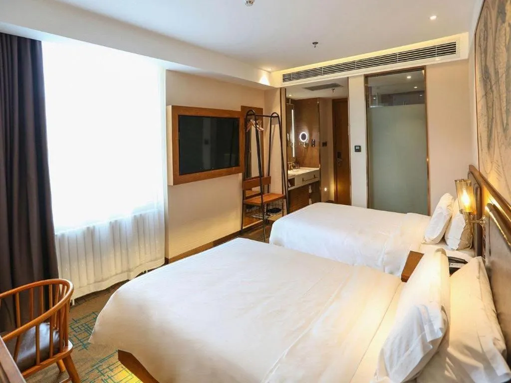 Bed in James Joyce Coffetel Changchun People's Square