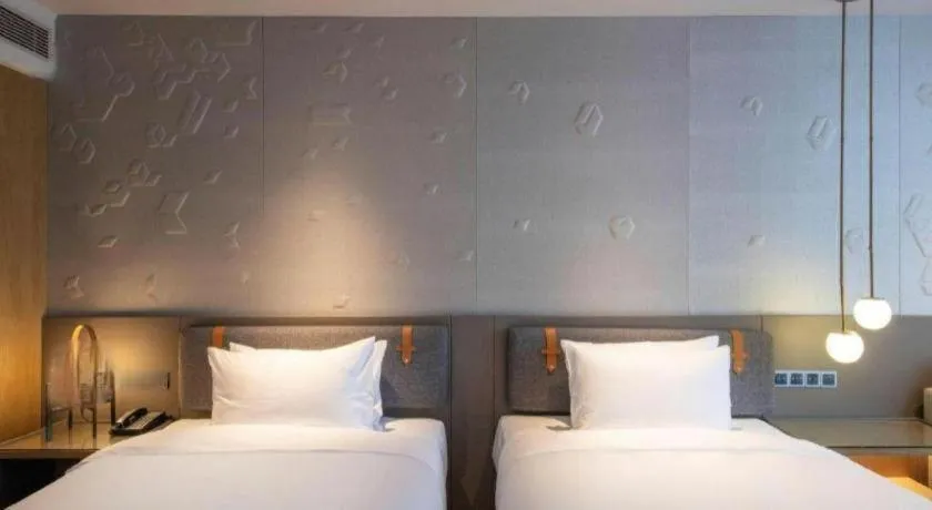 Bed in Zhejiang Cloud Mountain Deefly Hotel