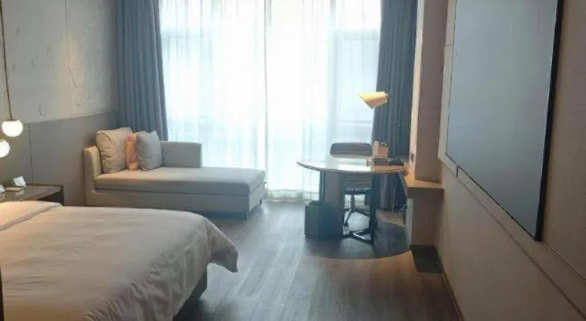 Bed in Zhejiang Cloud Mountain Deefly Hotel