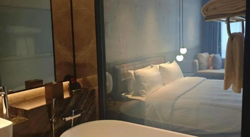 Bed in Zhejiang Cloud Mountain Deefly Hotel