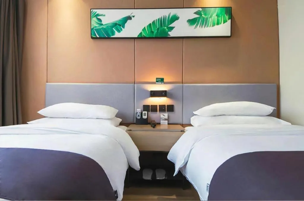 Bed in UP and IN Hotel Jiangxi Nanchang City Nanchang County Liantang Zhong Avenue Huarunwanjia