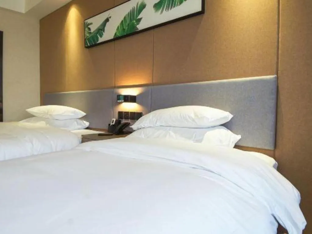 Bed in UP and IN Hotel Jiangxi Nanchang City Nanchang County Liantang Zhong Avenue Huarunwanjia