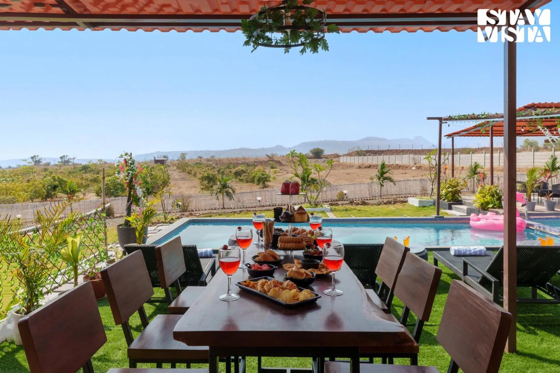 Dining area in StayVista at Mangifera Agro Estate with Pool, Wi-Fi