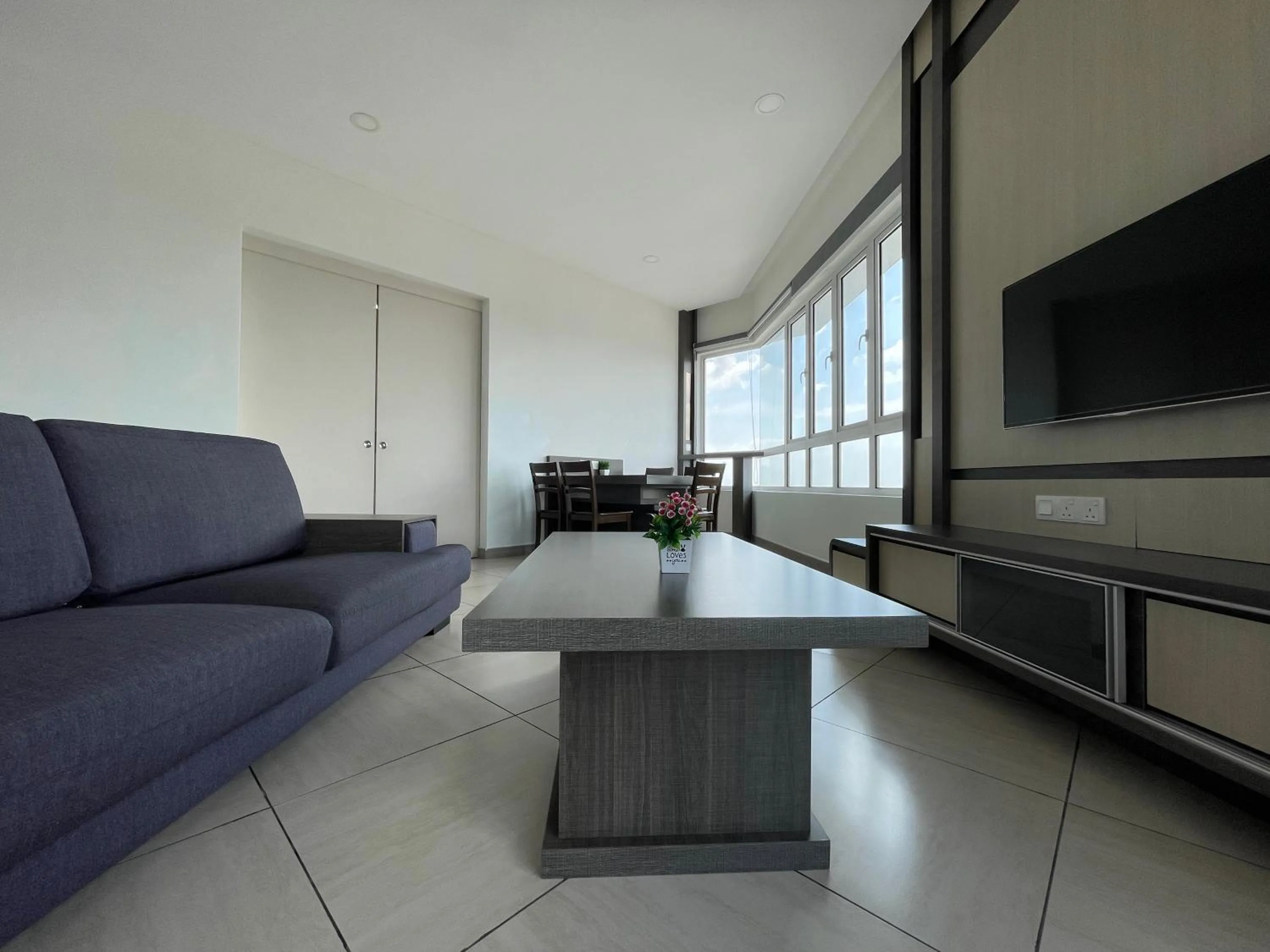 Communal lounge/ TV room in The Octagon Suites at Ipoh City Centre, 6 pax