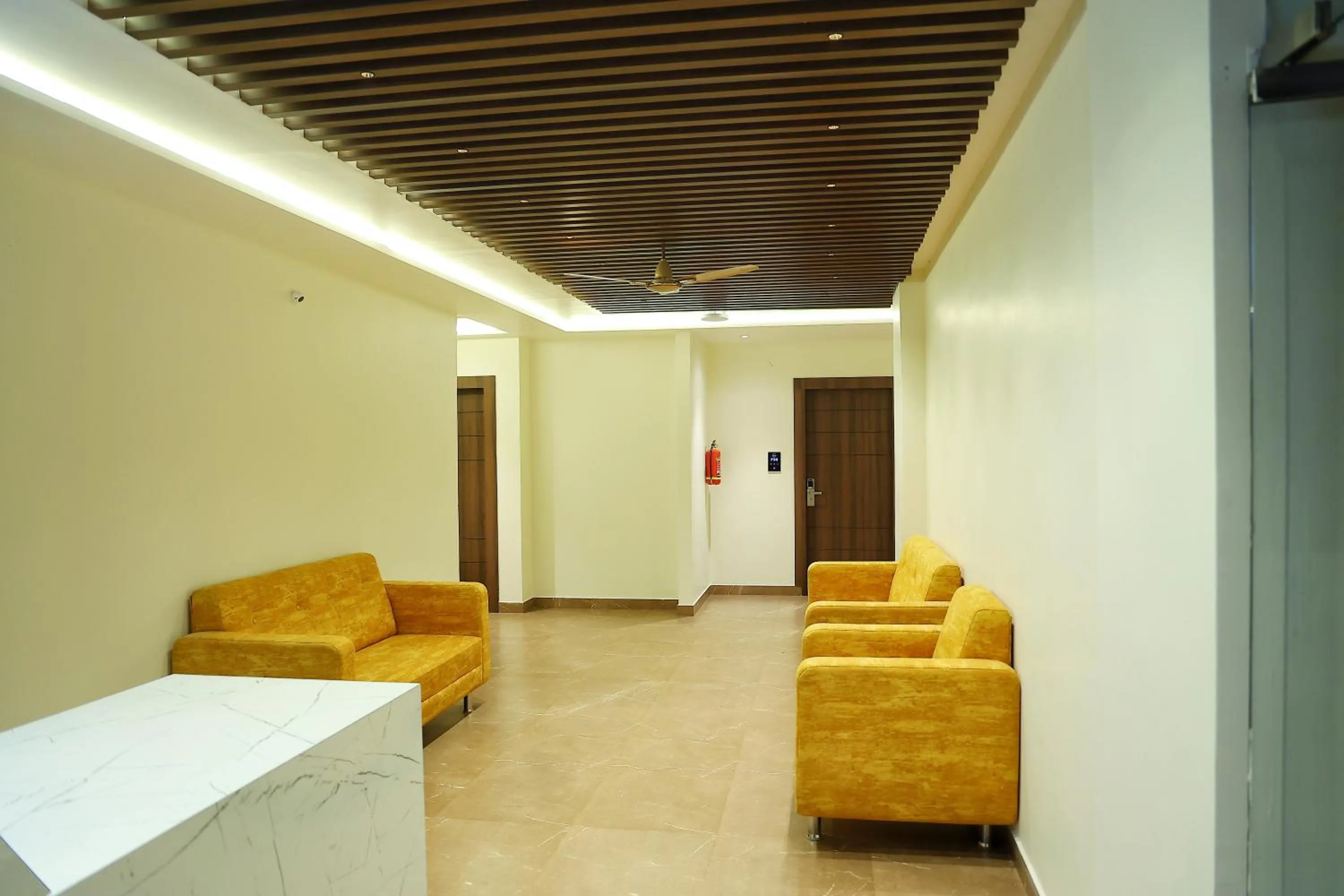 Seating area in Hotel Aaryan Comforts - Peenya