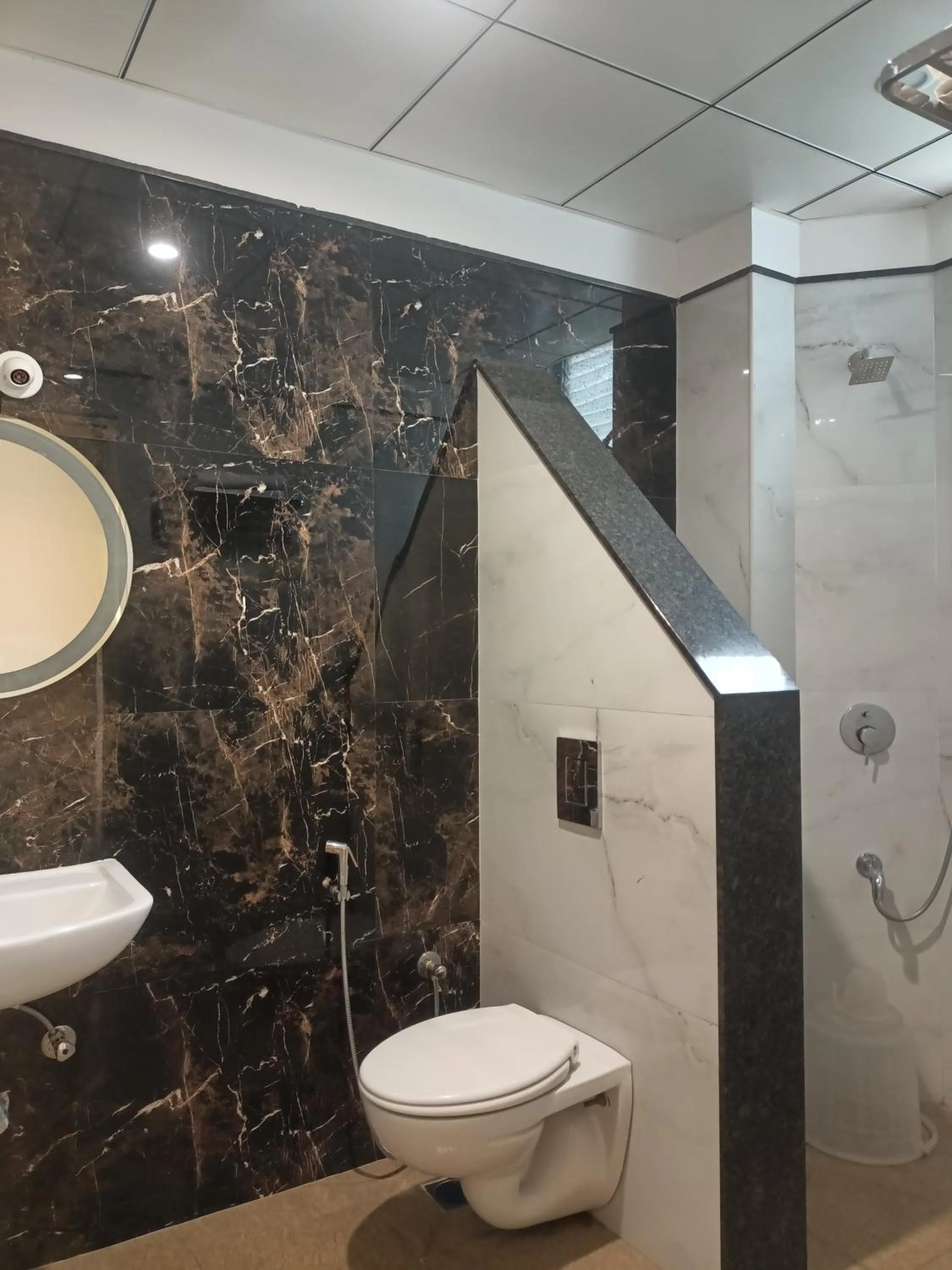 Bathroom in Hotel Aaryan Comforts - Peenya