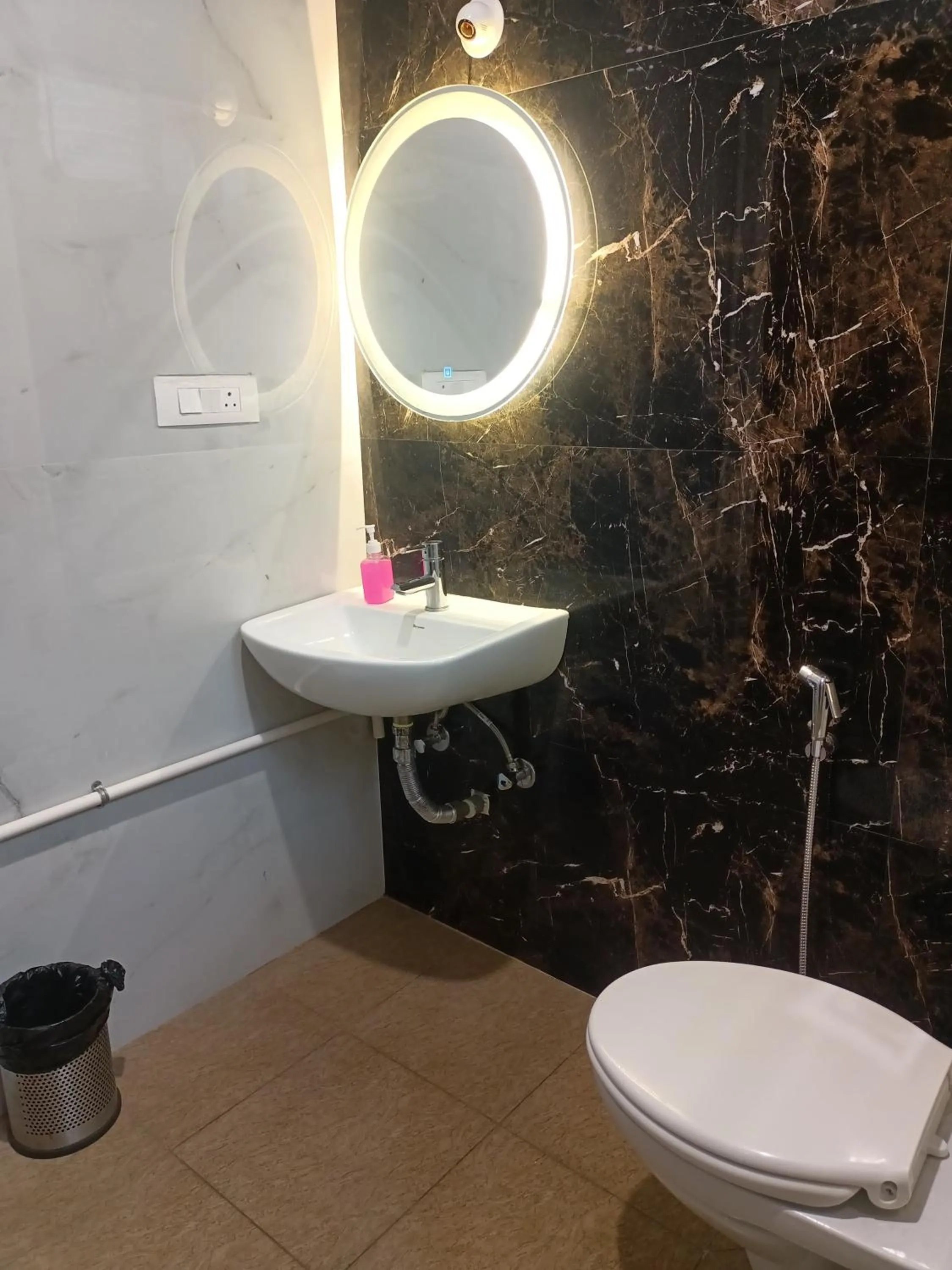 Bathroom in Hotel Aaryan Comforts - Peenya