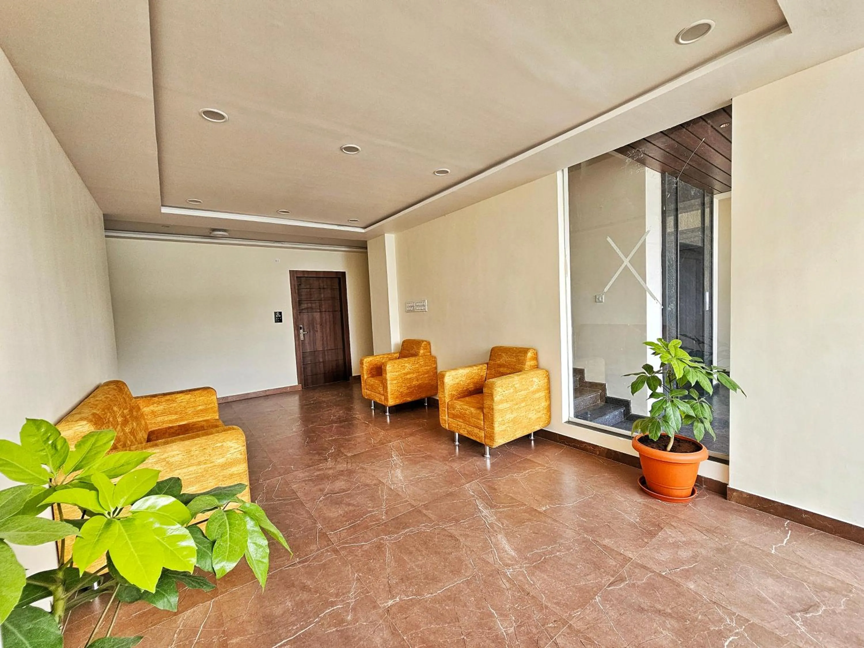 Lobby or reception in Hotel Aaryan Comforts - Peenya