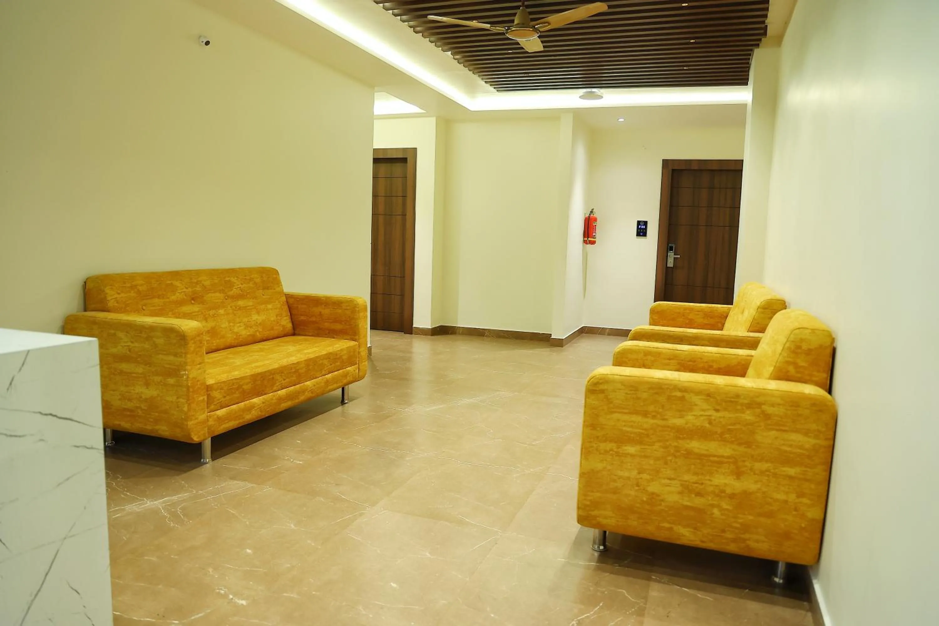 Seating area in Hotel Aaryan Comforts - Peenya