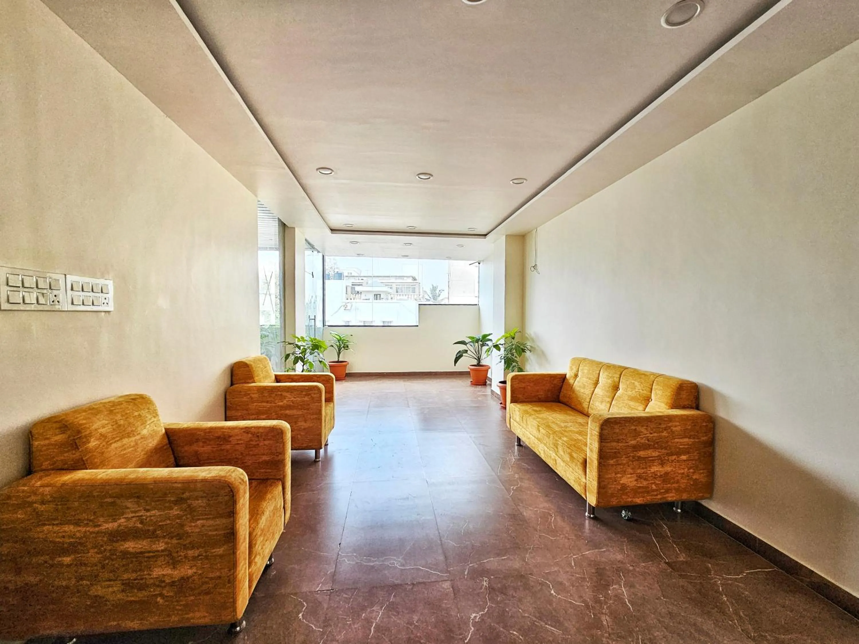 Seating area in Hotel Aaryan Comforts - Peenya