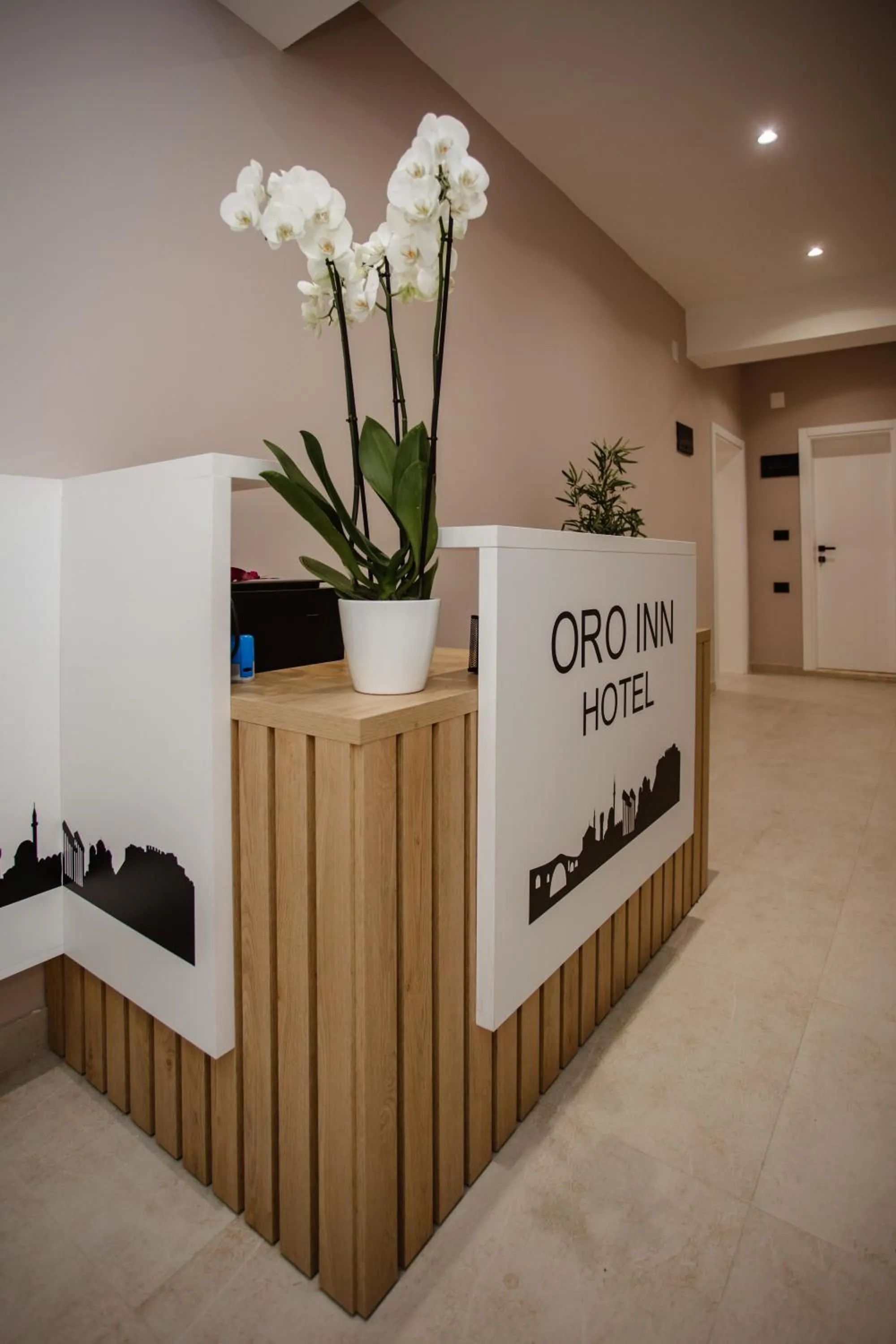 Property logo or sign in Oro Inn Hotel