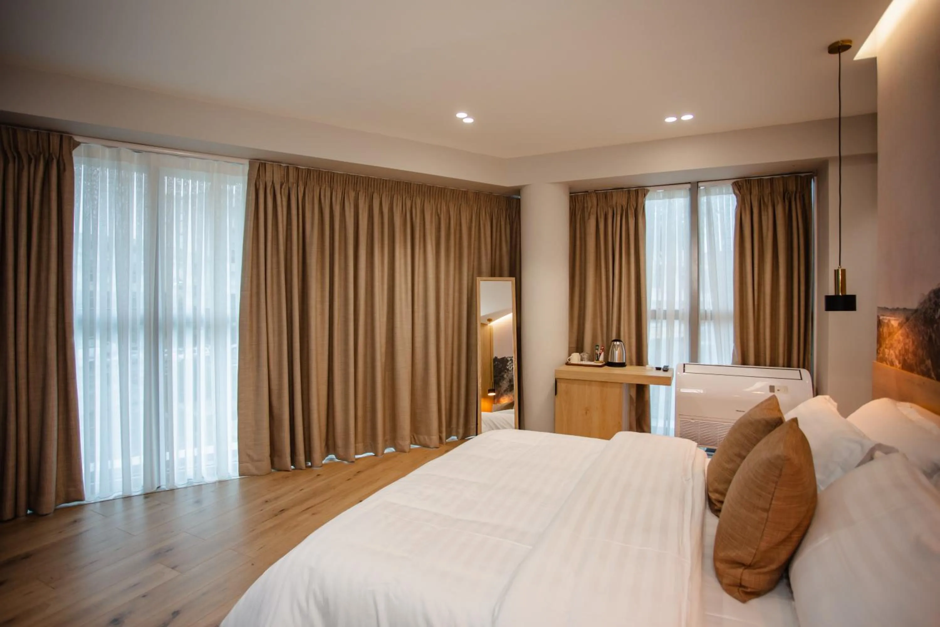 Bed in Oro Inn Hotel