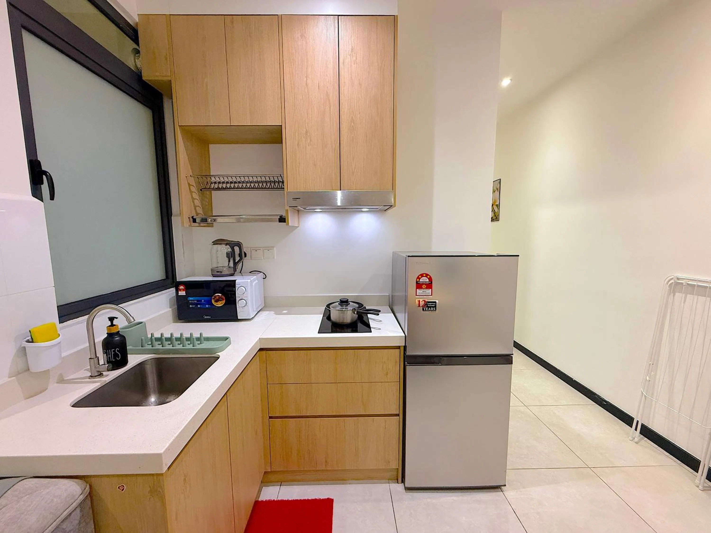 Kitchen or kitchenette in Neu Suites By Serenity Homes Near Gleneagles, KLCC & LRT