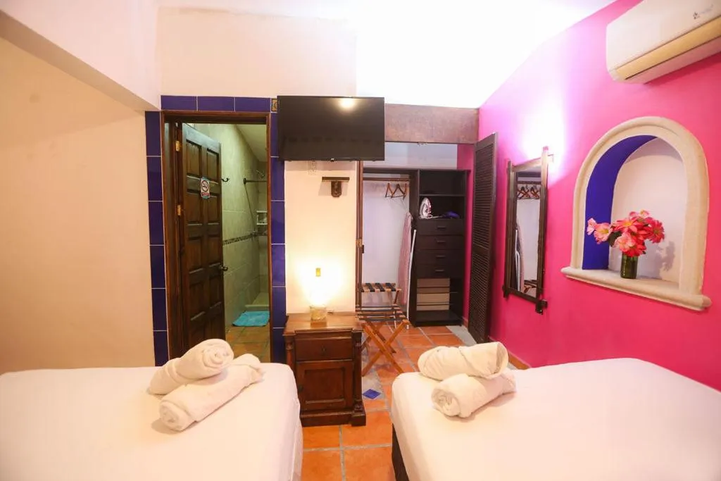 Bed in Íkaro Suites Colonial