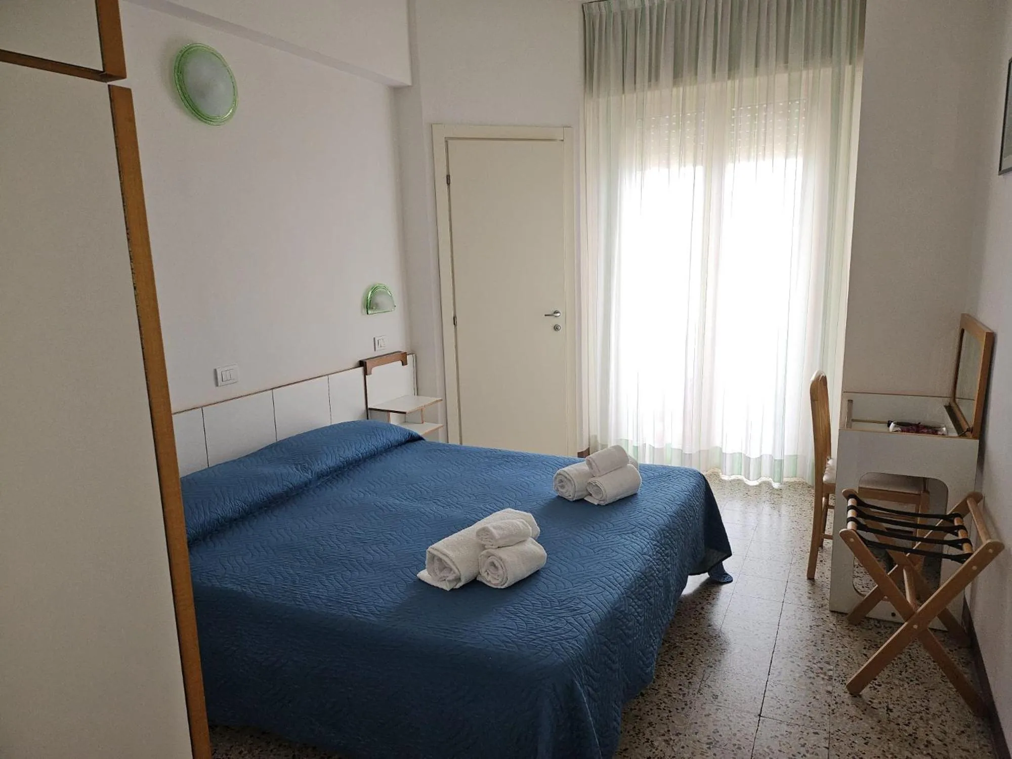 Bedroom in Hotel Villa Rosa