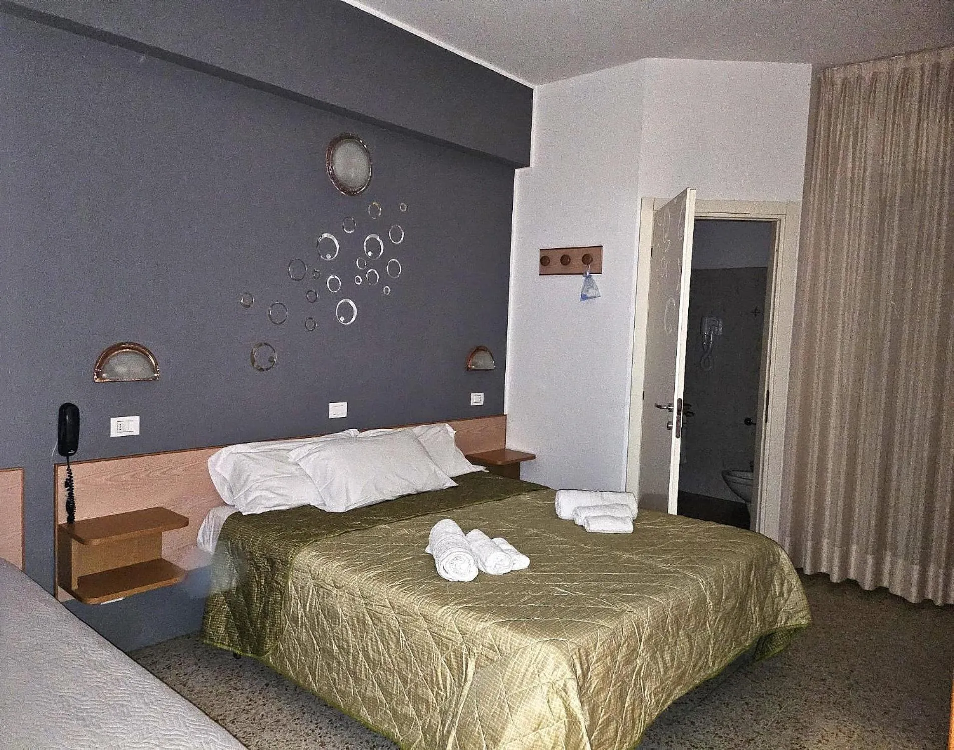 Bedroom in Hotel Villa Rosa