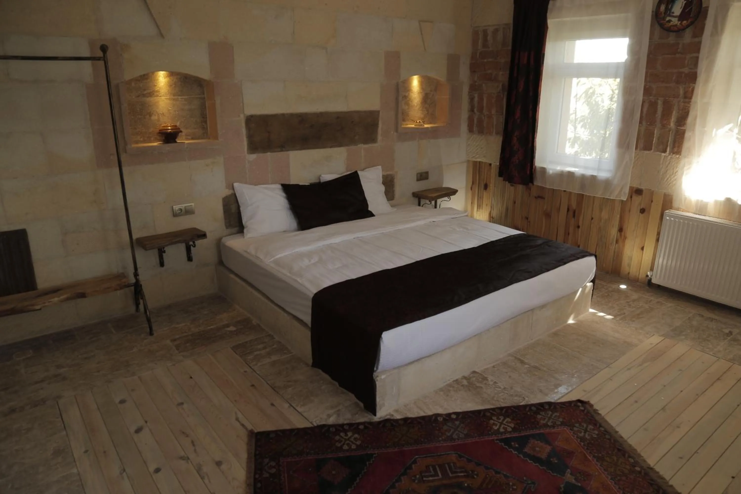 Bed in Philosophy Hotel