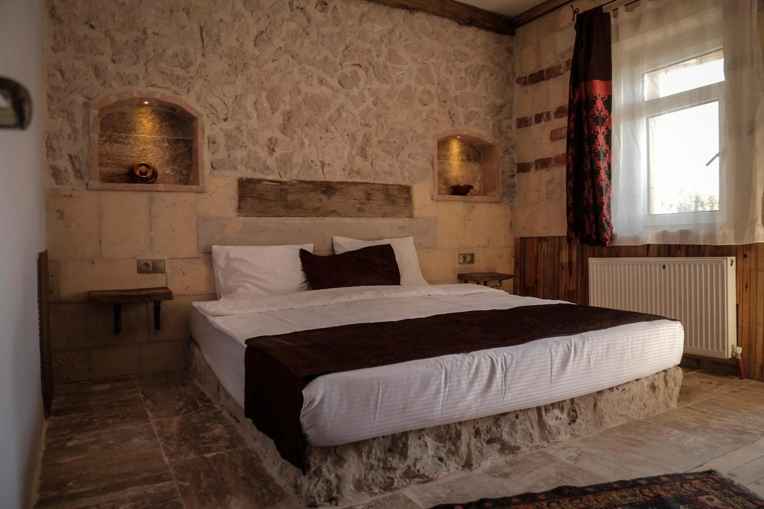Bed in Philosophy Hotel