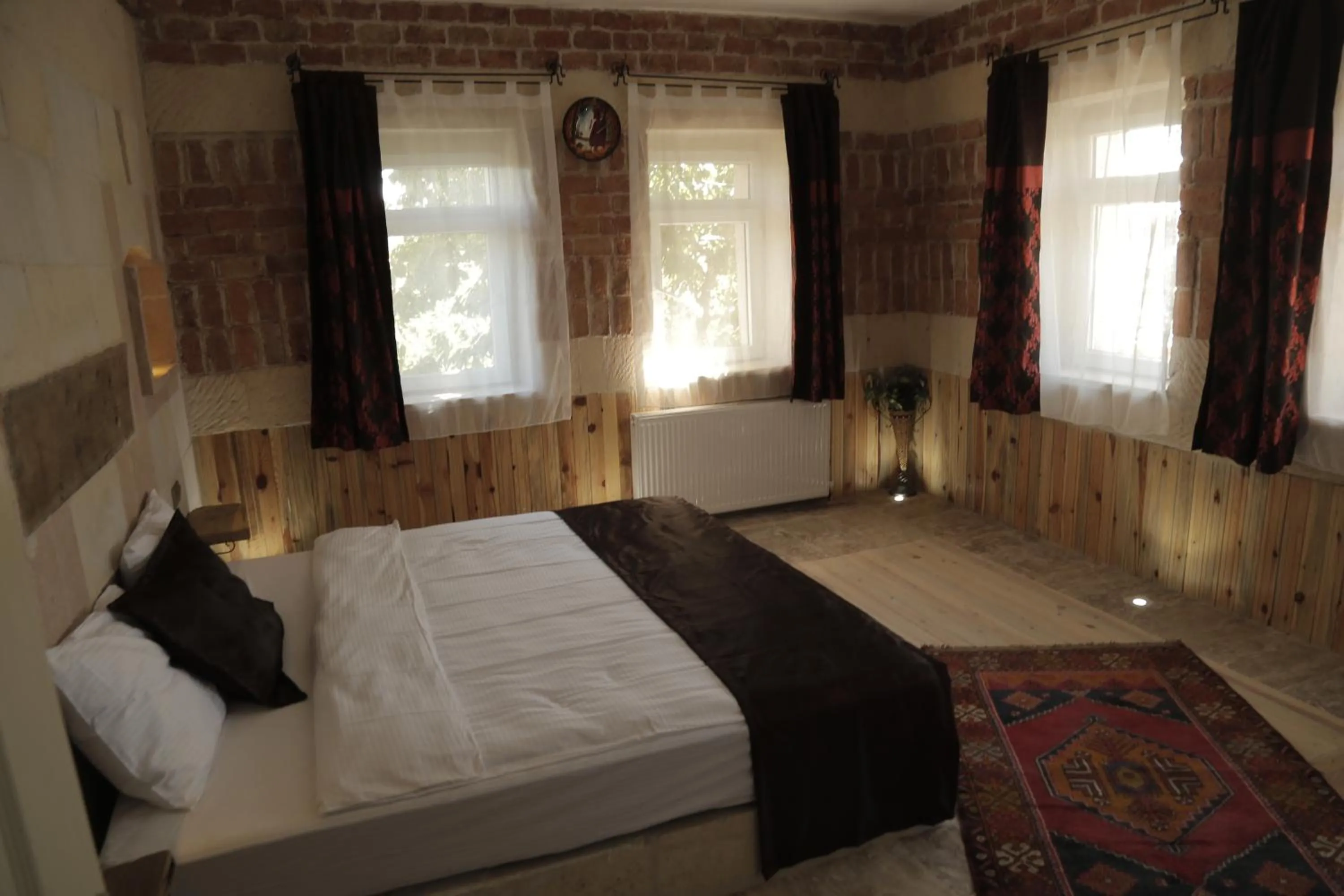 Bed in Philosophy Hotel