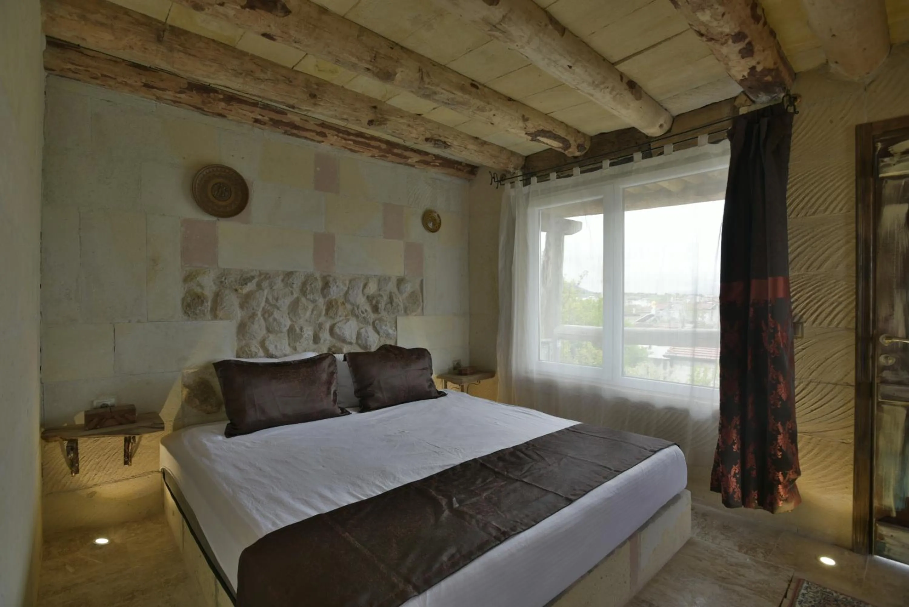 Bed in Philosophy Hotel