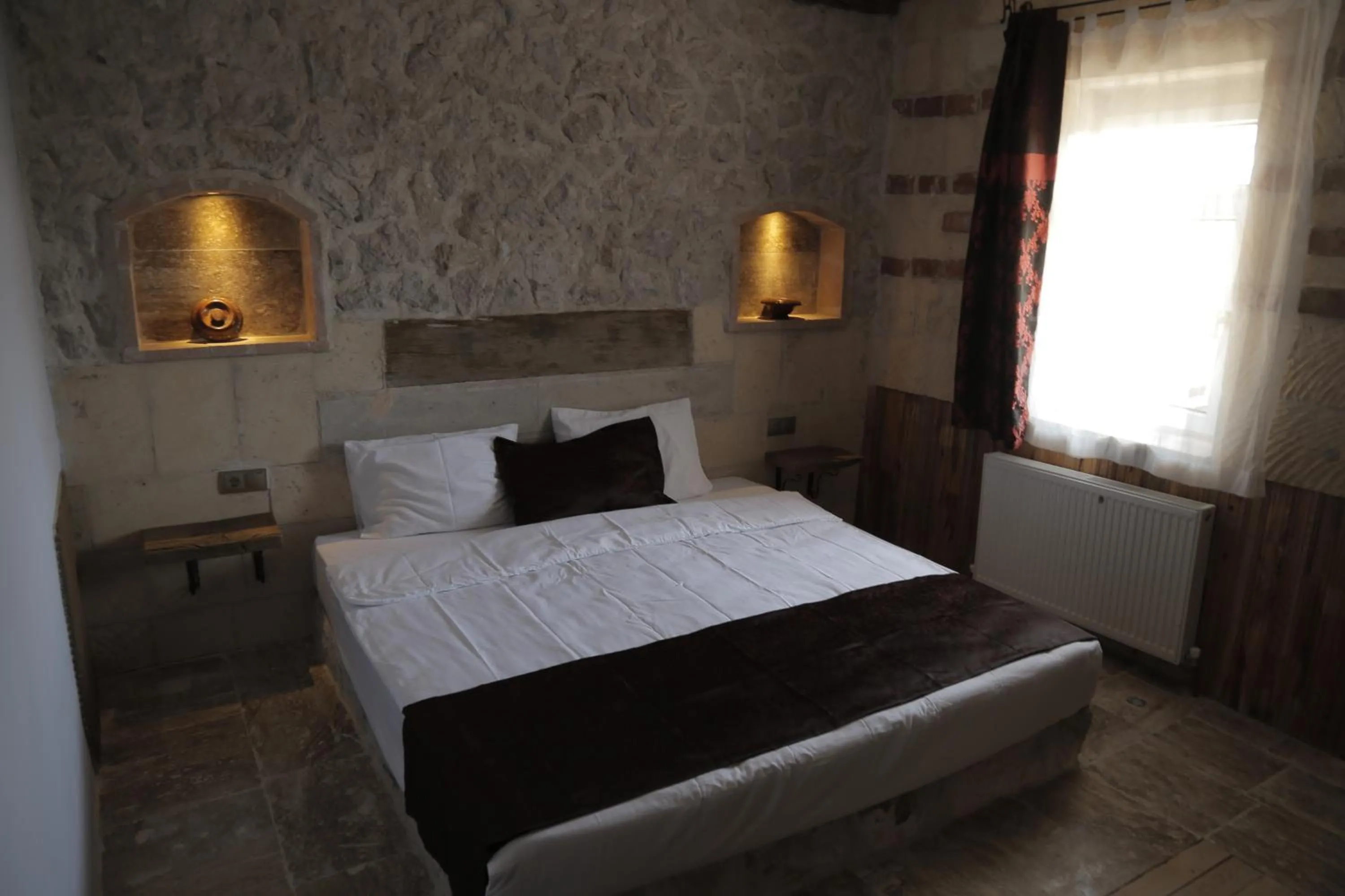Bed in Philosophy Hotel