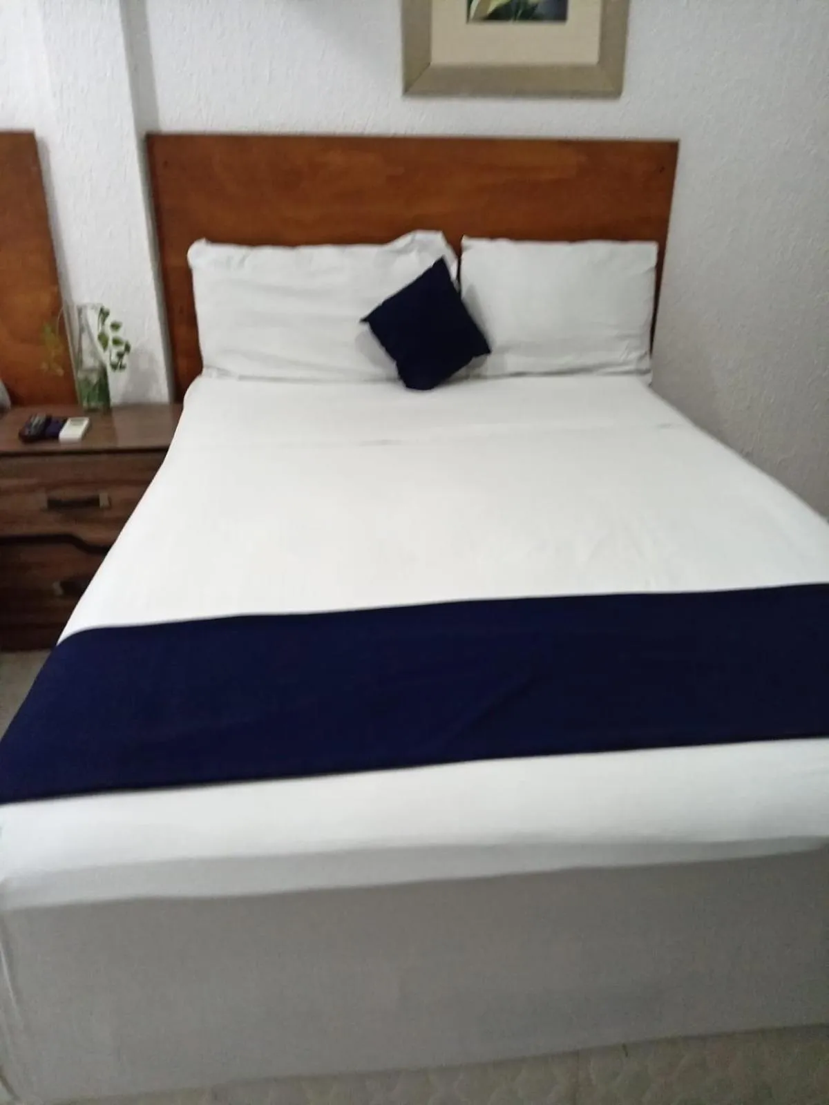 Bed in Íkaro Suites Cancún