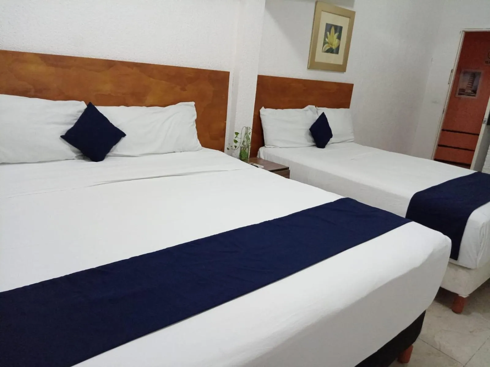 Bed in Íkaro Suites Cancún