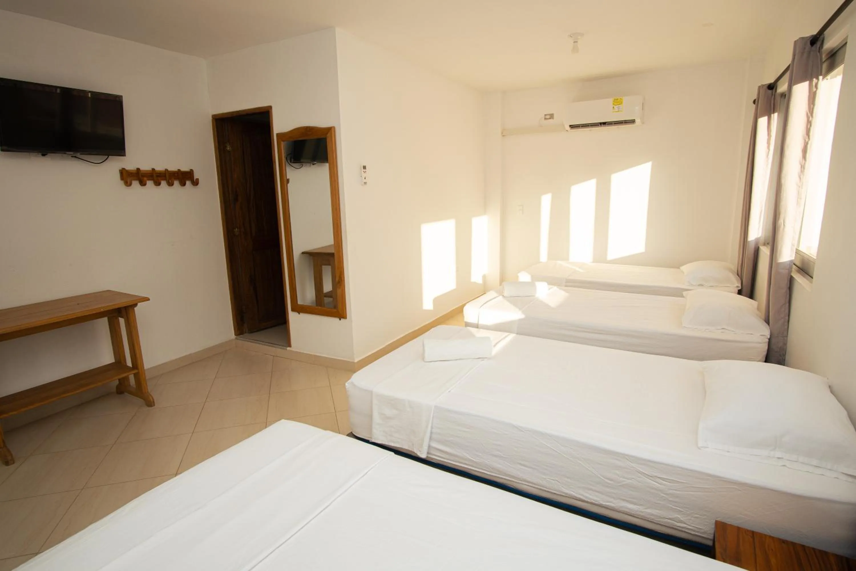 Photo of the whole room, Bed in Hotel Caribe Coveñas