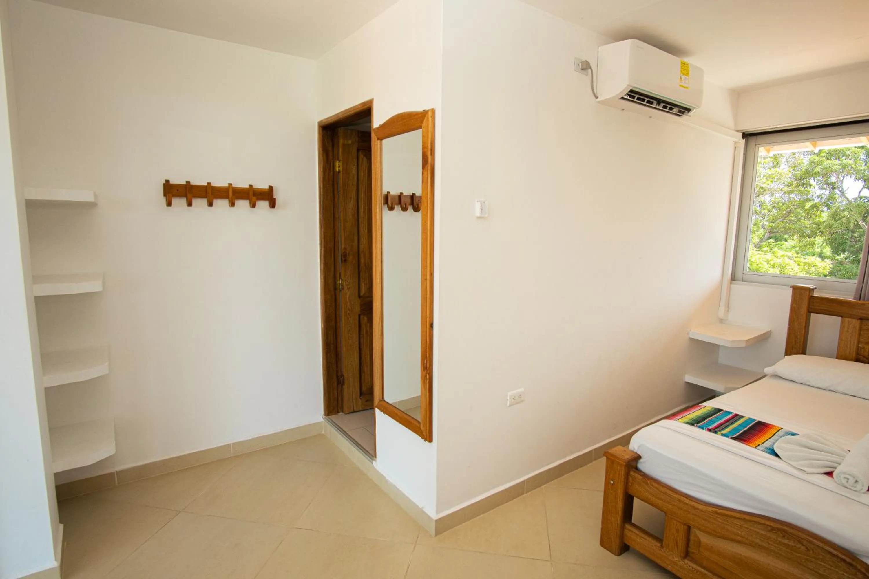 Photo of the whole room, Bed in Hotel Caribe Coveñas