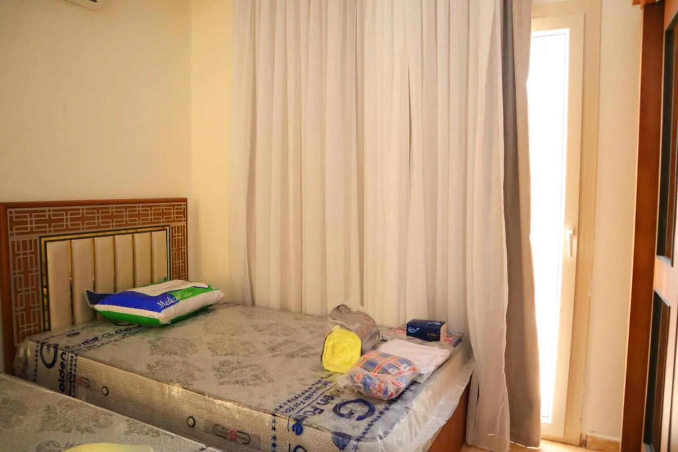 Bed in Hostgool Beach Chalets Mirage bay resort & aqua park