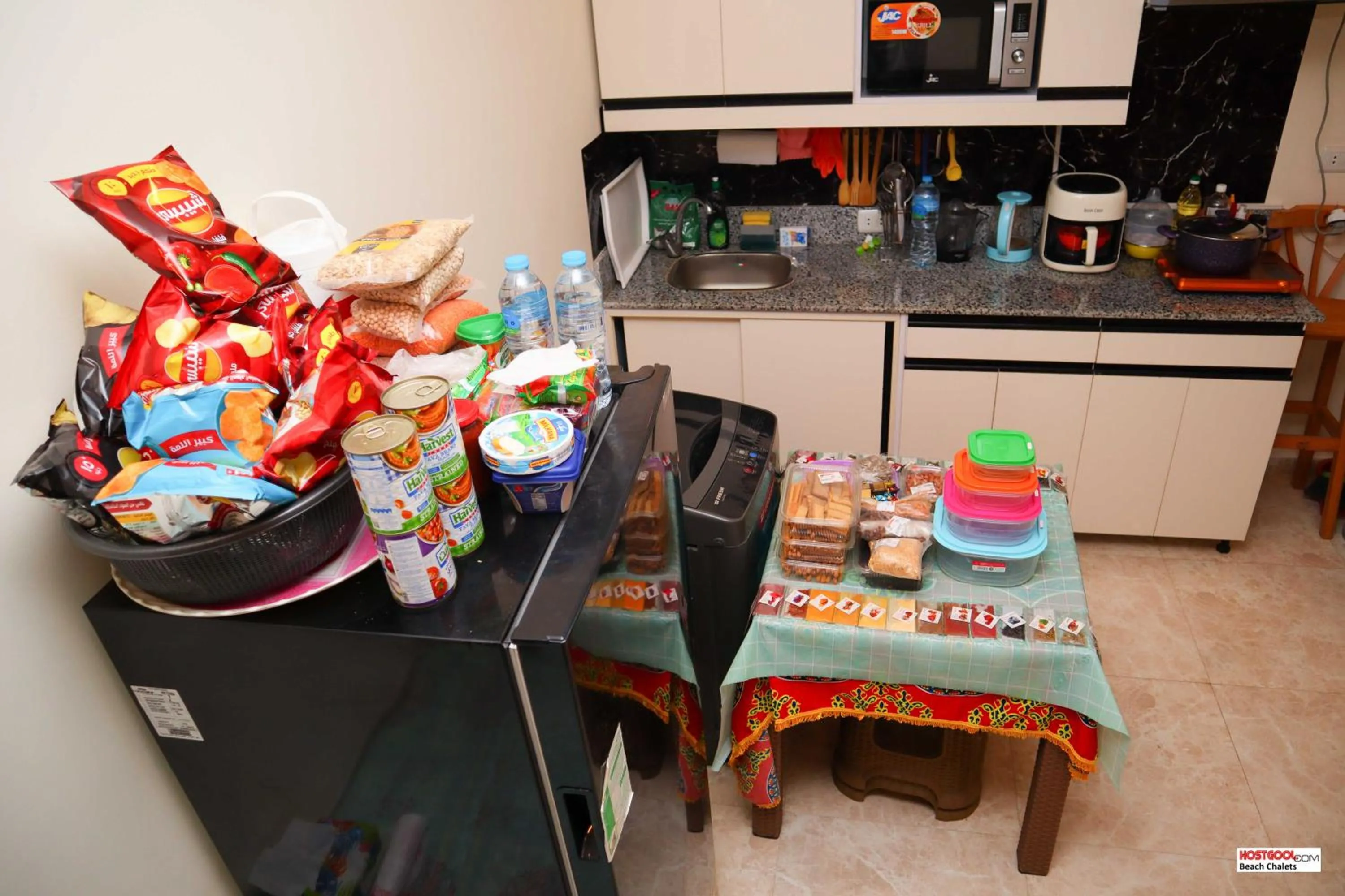 Kitchen or kitchenette in Hostgool Beach Chalets Mirage bay resort & aqua park