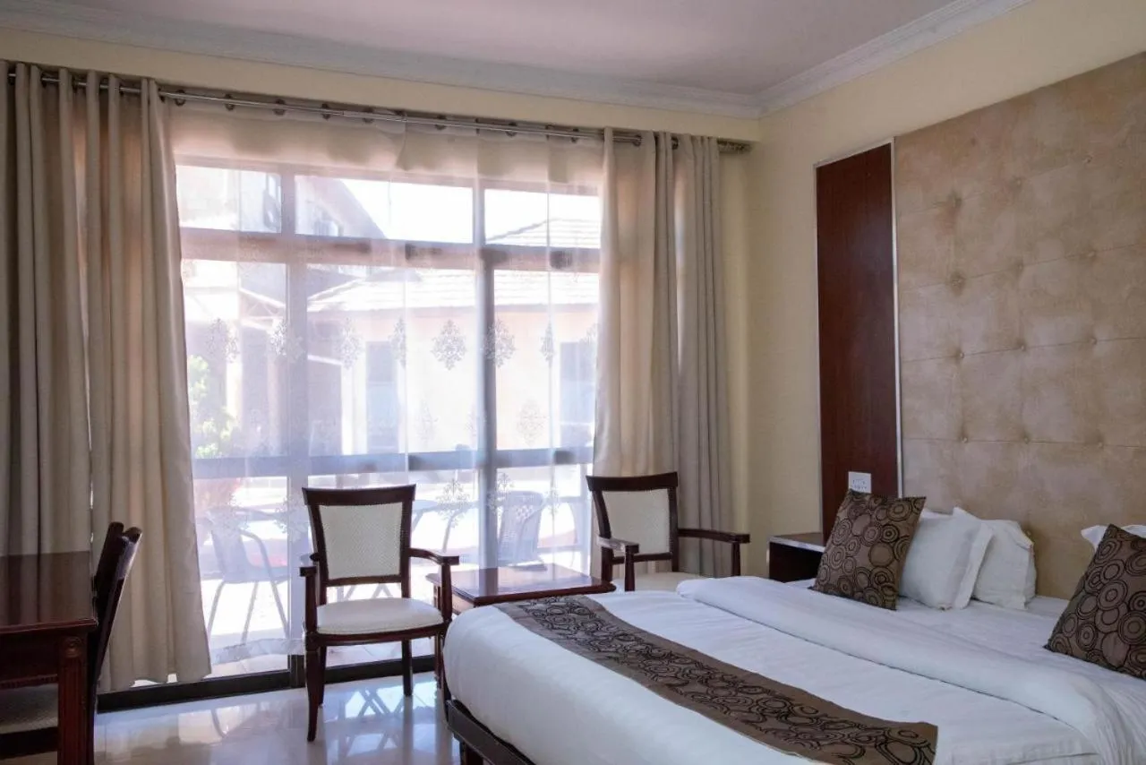 Bed in Mika Hotel Kabulonga