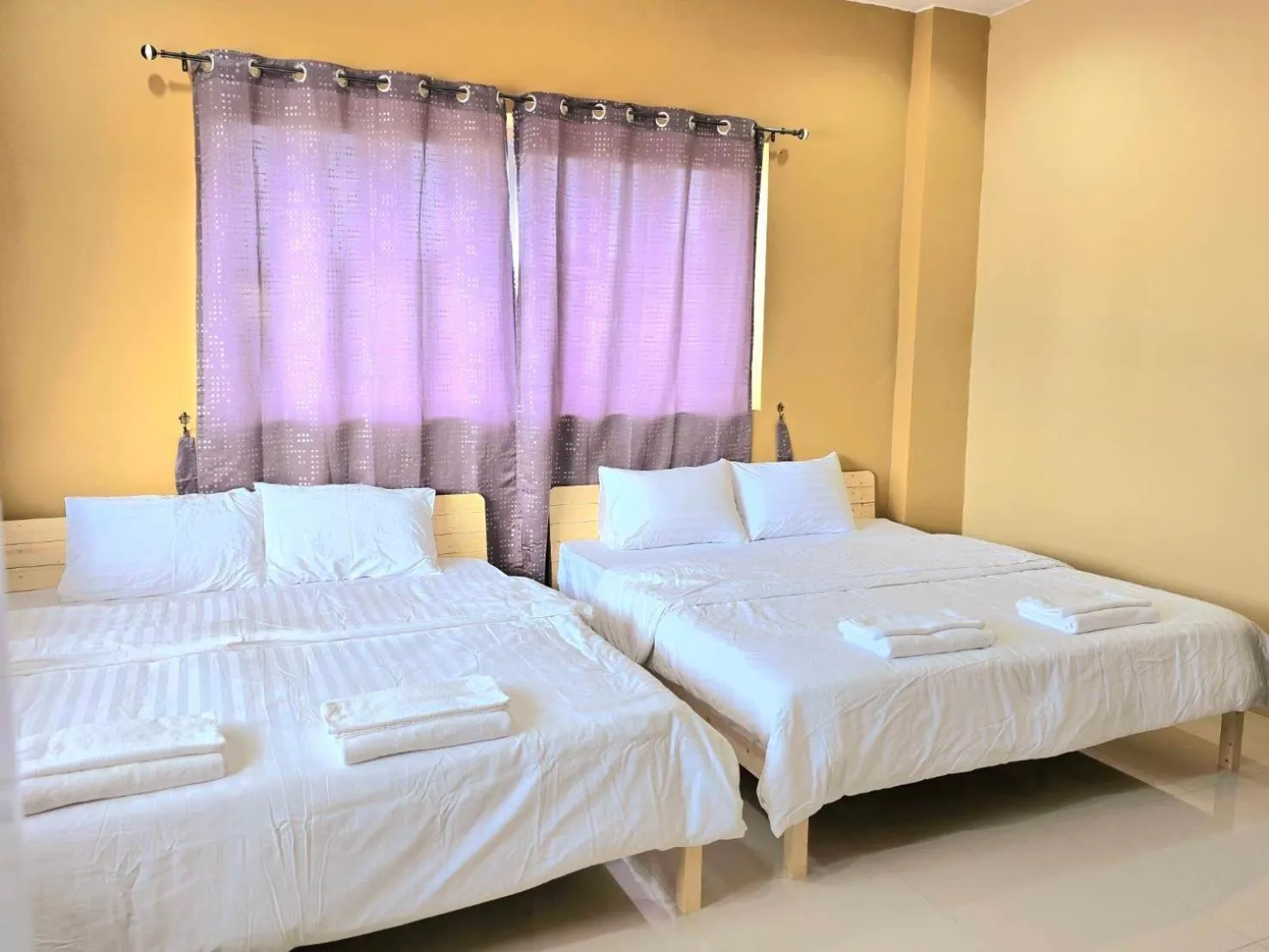 Bed in The Bua Boutique Resort