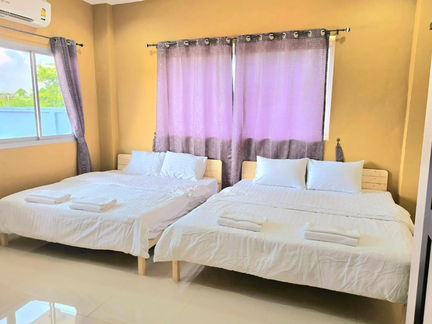 Bed in The Bua Boutique Resort