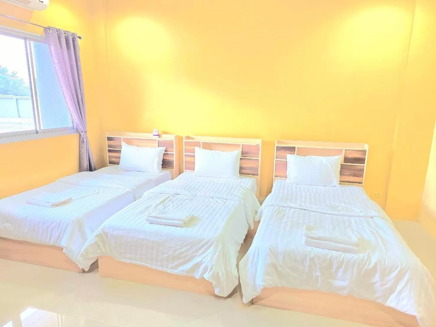 Bed in The Bua Boutique Resort