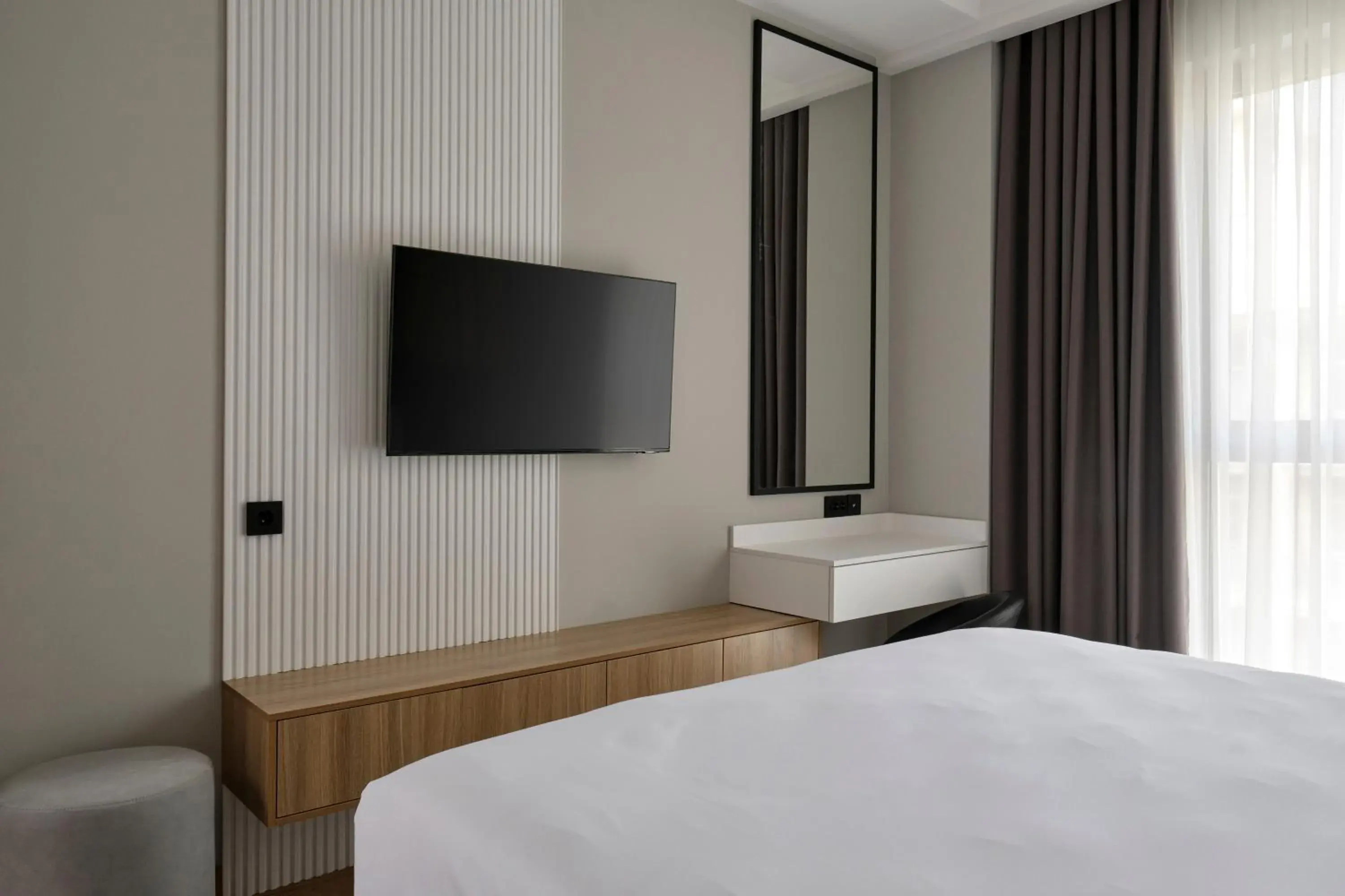 Bed in STYLO Residences & Suites Bed in STYLO Residences & Suites