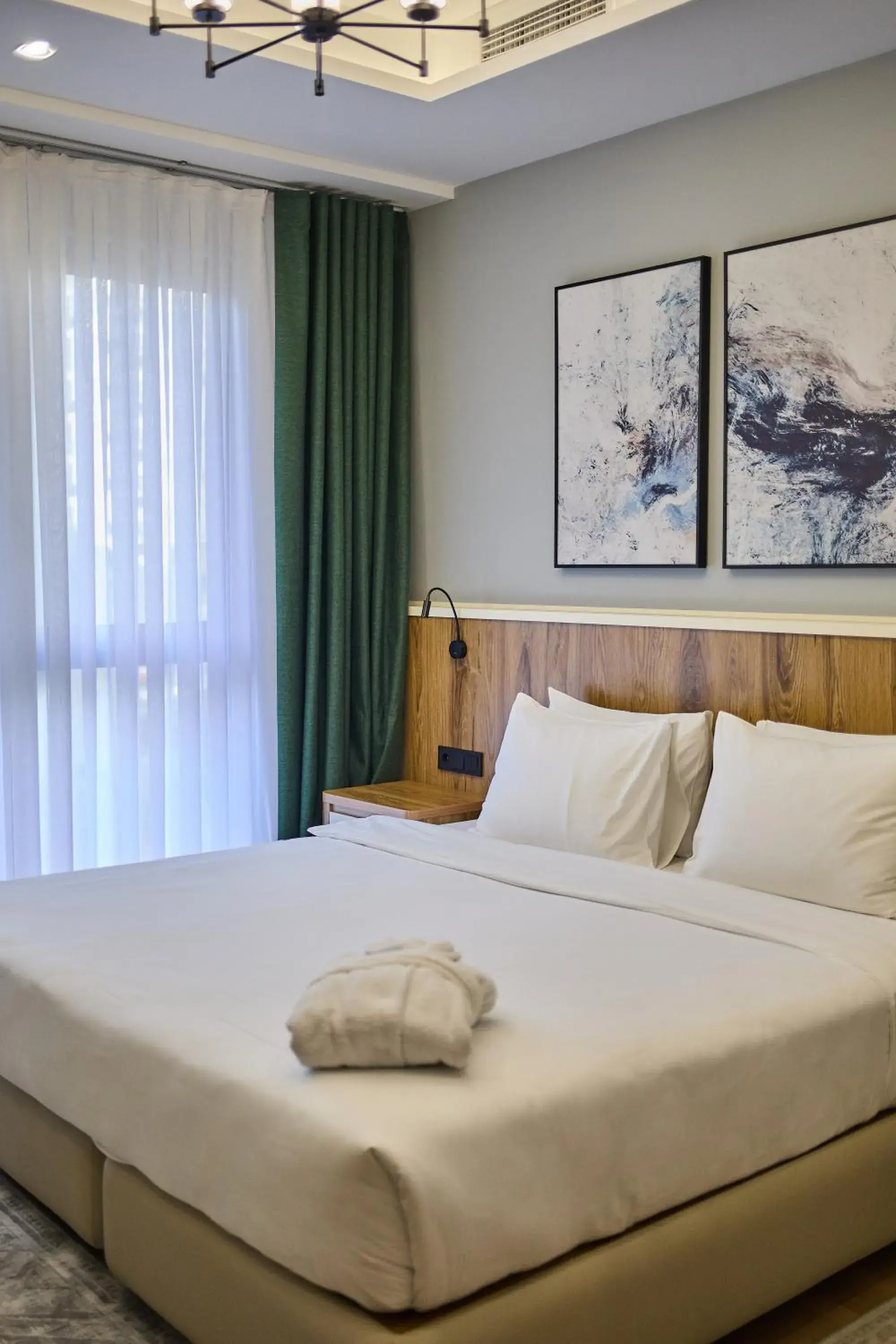 Bed in STYLO Residences & Suites Bed in STYLO Residences & Suites