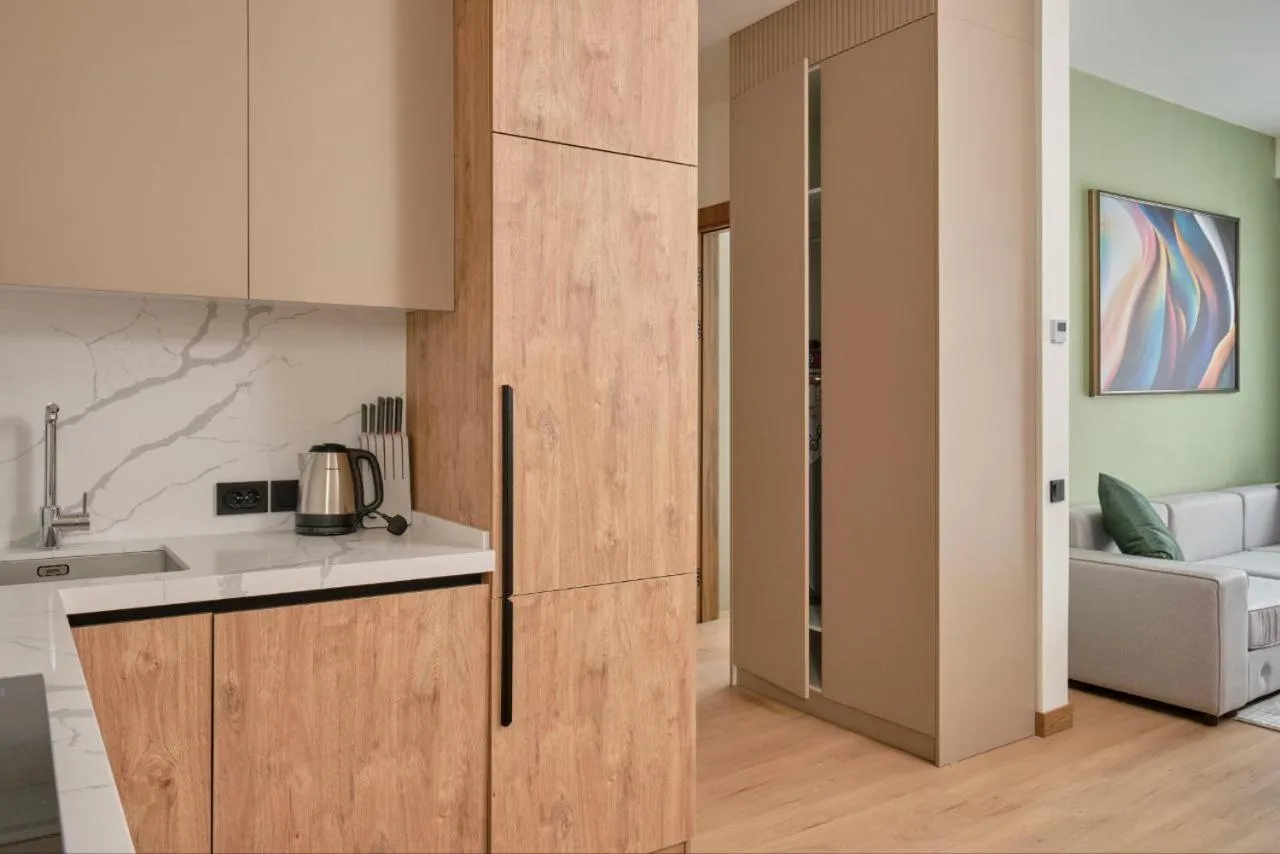 Kitchen or kitchenette in STYLO Residences & Suites