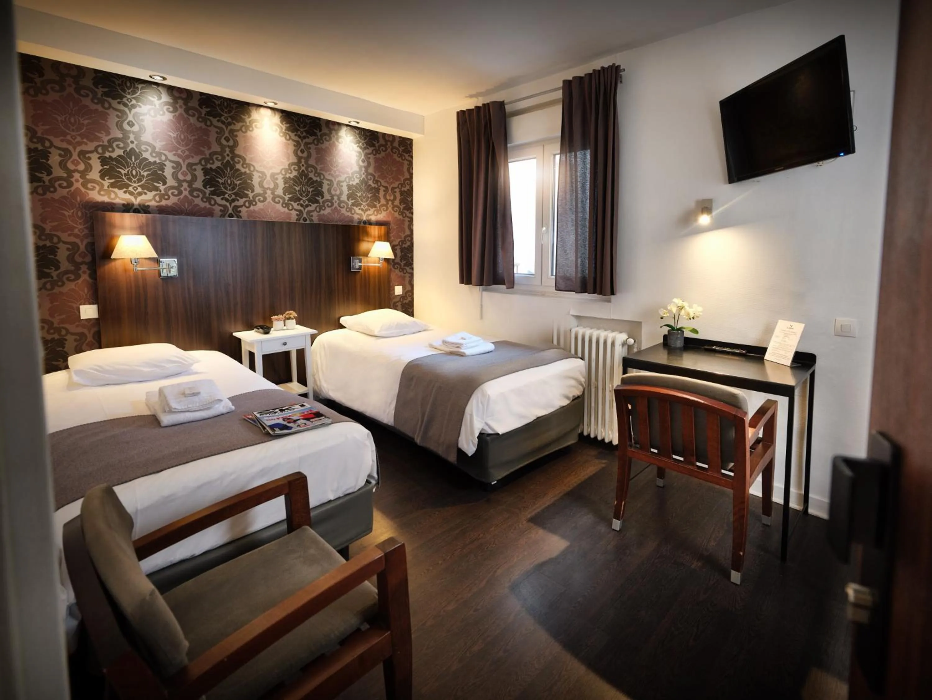 Bed in Hotel Les Negociants