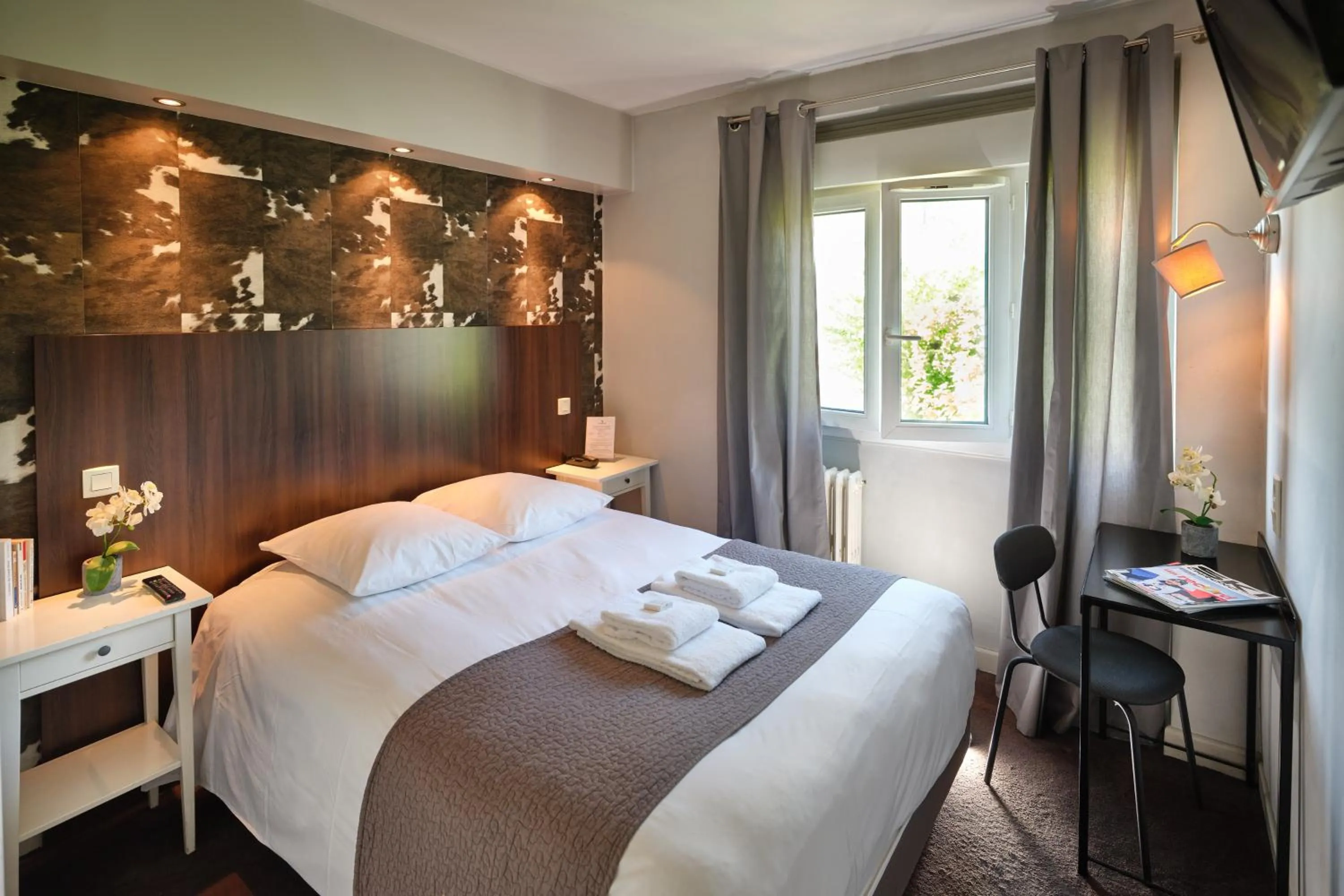 Bed in Hotel Les Negociants