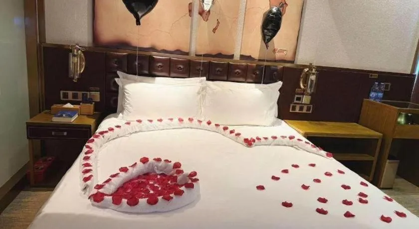 Bed in James Joyce Coffetel Shijiazhuang Wanda Plaza Tangu Metro Station