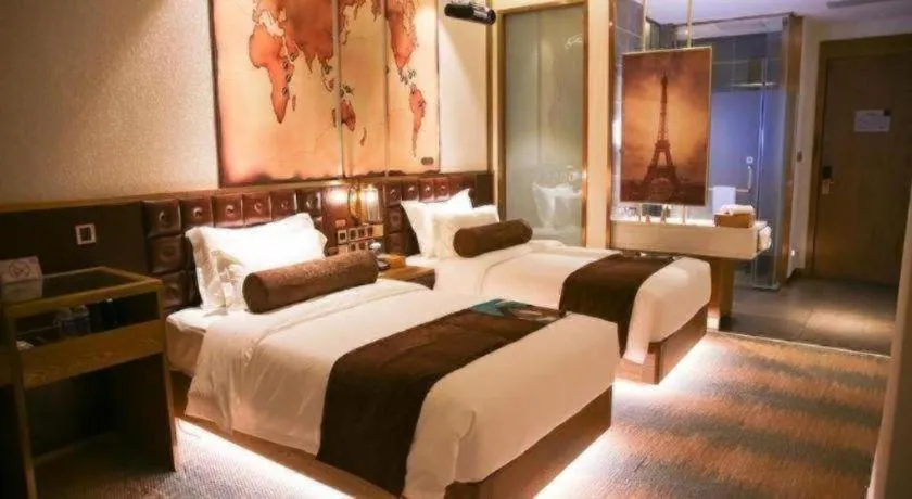 Bed in James Joyce Coffetel Shijiazhuang Wanda Plaza Tangu Metro Station