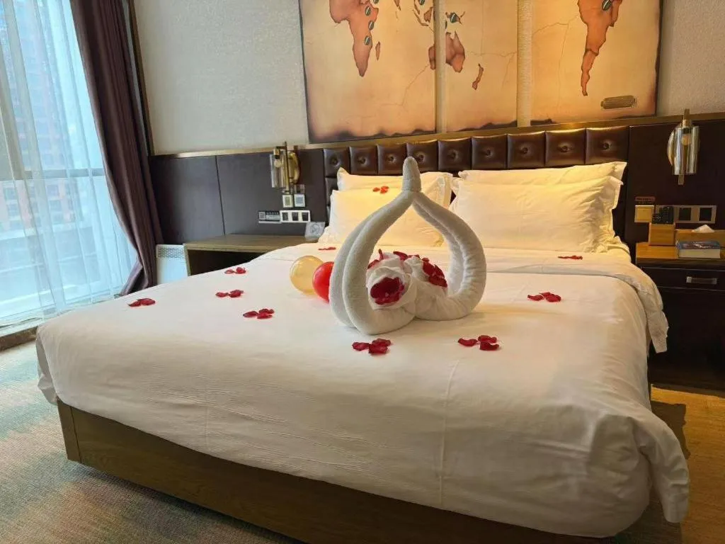 Bed in James Joyce Coffetel Shijiazhuang Wanda Plaza Tangu Metro Station