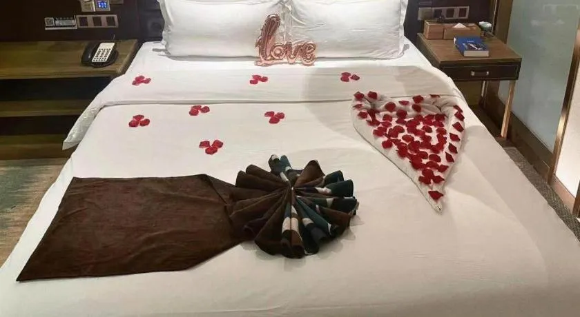 Bed in James Joyce Coffetel Shijiazhuang Wanda Plaza Tangu Metro Station