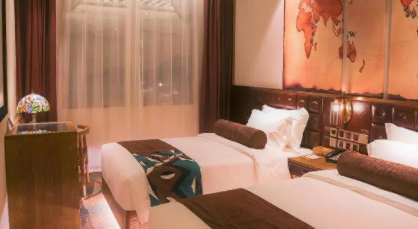 Bed in James Joyce Coffetel Shijiazhuang Wanda Plaza Tangu Metro Station