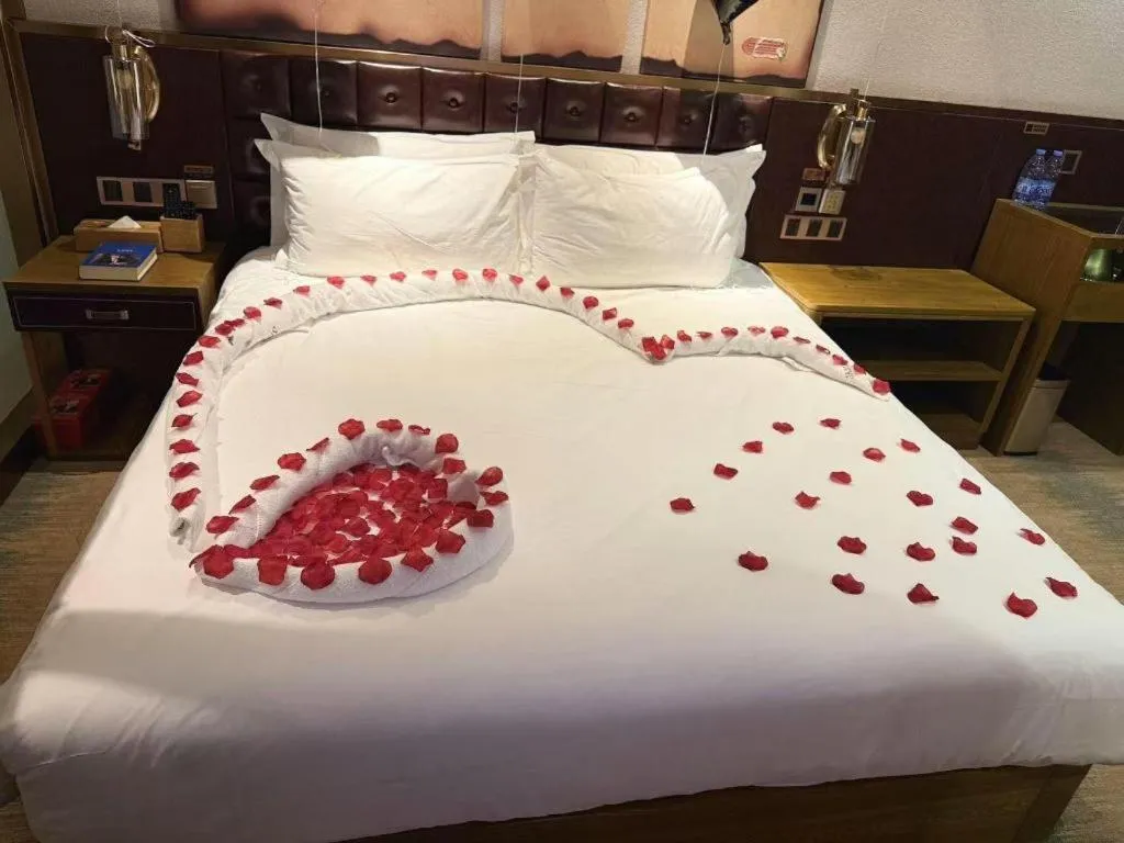 Bed in James Joyce Coffetel Shijiazhuang Wanda Plaza Tangu Metro Station