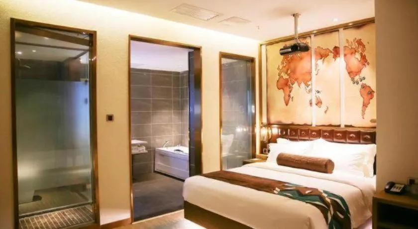 Bed in James Joyce Coffetel Shijiazhuang Wanda Plaza Tangu Metro Station