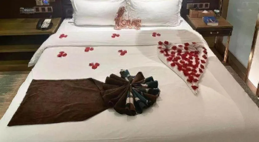 Bed in James Joyce Coffetel Shijiazhuang Wanda Plaza Tangu Metro Station