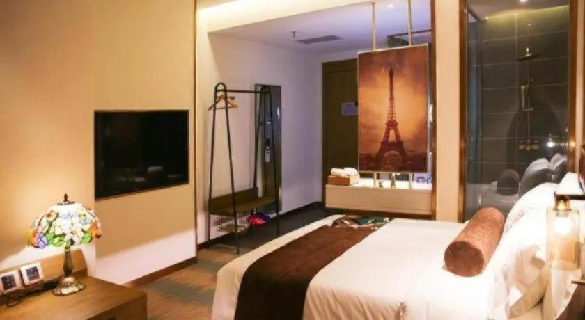 Bed in James Joyce Coffetel Shijiazhuang Wanda Plaza Tangu Metro Station